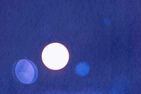 Combination of grunge paper and bokeh lights as abstract background.の写真素材