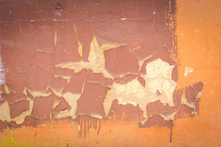 Grunge dirty wall close up, red cracked plaster background.の写真素材