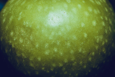 Close up vintage background with green apple, still life.の写真素材