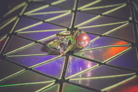 Fashion silver ring decorated with natural amethyst gemstone filtered.の写真素材