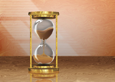 Decorative vintage style hourglass on a wooden table background.