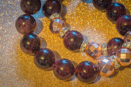 Beaded bracelet with natural garnet and rose gold plated hematite stones.