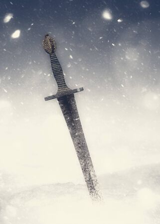 Medieval weapon 3d rendered sword surrounded by the falling snowの写真素材