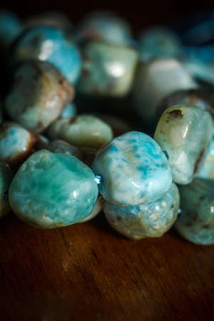 Light blue natural larimar stone beads in an irregular shape.の写真素材