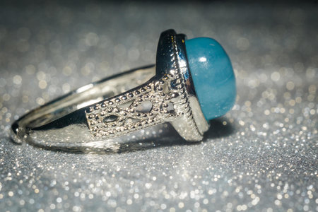 Fashion silver ring with a blue aquamarine stone.の写真素材