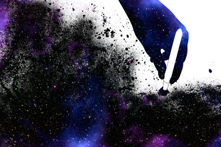 Human hand holding paintbrush and abstract starry space design.