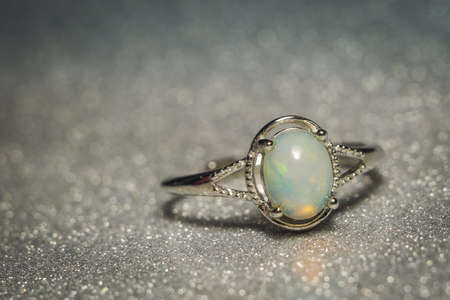 Fashion silver ring with natural white ethiopian opal stone.の写真素材