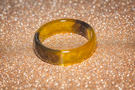 Retro fashion stone ring, natural brown agate, close up.の写真素材