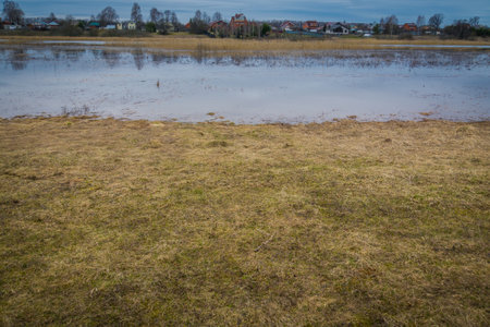 Early spring flood of the river, rural landscape.の写真素材