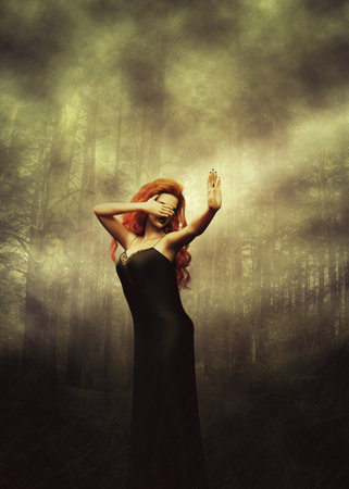 Dark foggy forest and red haired witch woman, 3D Illustration.の写真素材
