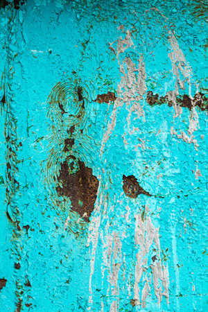 Texture of turquoise paint on rusty metal as abstract background.の写真素材