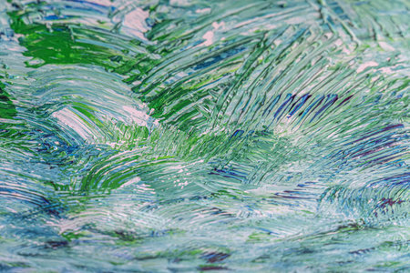 Hard paint strokes of blue and green color.