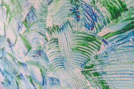 Hard paint strokes of blue and green color.の写真素材