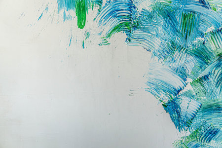 Hard paint strokes of blue and green color.の写真素材