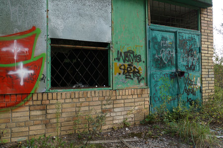 Broken and abandoned store building in the rural town.の写真素材