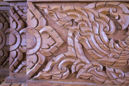 Closeup of wood carving in thai art.の写真素材