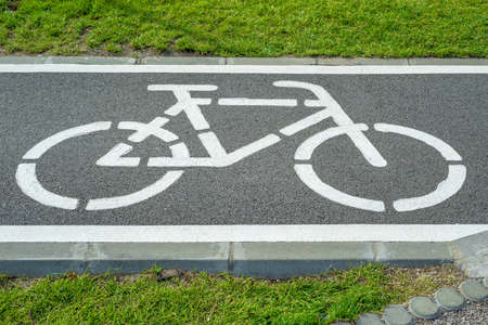 Bicycle sign on a bicycle lane in the cityの写真素材