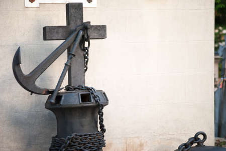 Cross and anchor on a tomb in the Bellu cemetery, Romaniaの写真素材