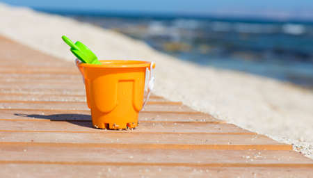 Orange toy bucketの写真素材