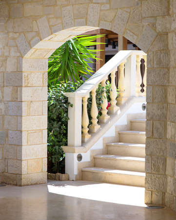 Stairs with balustrade and old pattern vintage wallの写真素材