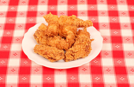 Fresh crispy chicken on a white plateの写真素材