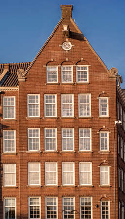Old traditional dutch building in Amsterdam, Netherlandsの写真素材