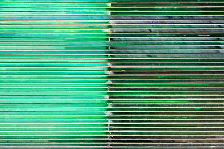 A pile of pieces of green glassの写真素材