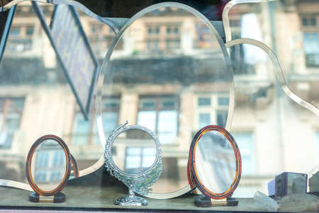 Mirrors of different shapes and sizes for saleの写真素材