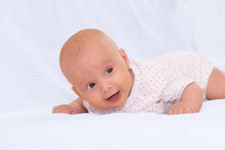 Portrait of an adorable little baby girlの写真素材