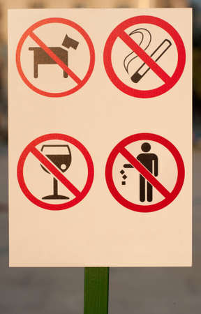 Prohibiting signs: no dog, not smoking, not drink, without garbageの写真素材