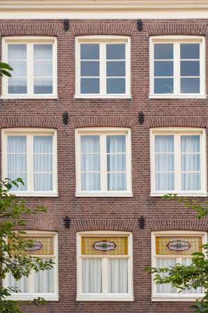 Brick wall with windows in Amsterdam Netherland