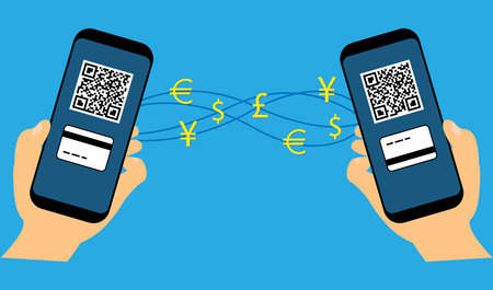 Hands holding two mobile phones: concept of mobile payment
