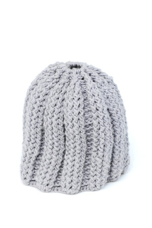 Knitted hat on white background