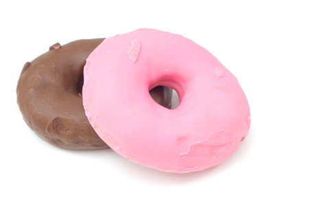 strawberry and chocolate glazed donut on white background