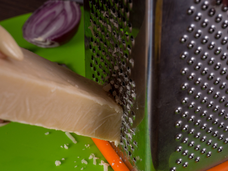 Photo of cheese and graters on the table.の写真素材