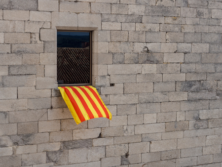 Photo of the Spanish flag on the windowの写真素材