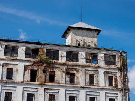White ruined building against the blue skyの写真素材