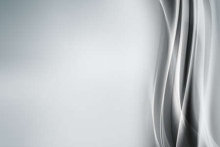 White waves abstract texture on grey background.の写真素材