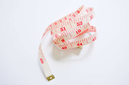 Measuring Tape on the white backgroundの写真素材