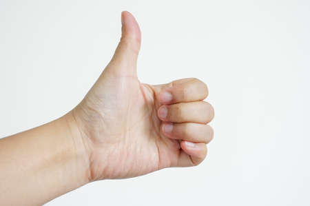isolated hand thumb upの写真素材