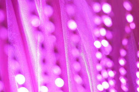 Pink Fabric and light bokeh backgroundの写真素材