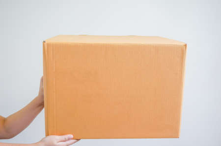 woman hand's is sending a boxの写真素材