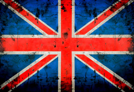 An image of the British flag on an old, dirty wall. The flag of Great Britain with black spots and a vignette.の写真素材