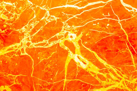 The marble wall is yellow. Bright, yellow background with marble texture.の写真素材