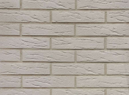 Gray brick wall close-up. Gray background with texture.の写真素材