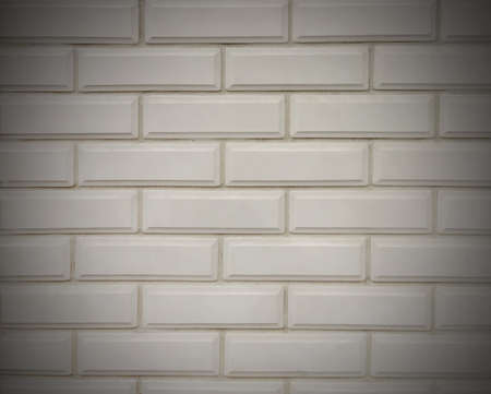 Gray brick wall close-up. Grey background with texture and vignette.の写真素材