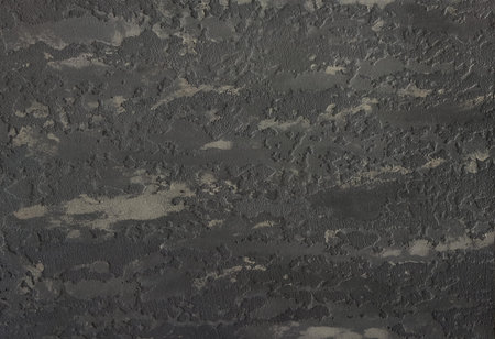 Dark gray, abstract background with scuffs and roughness. An old wall with a dark gray texture.