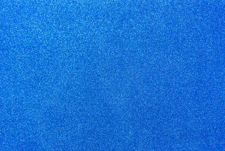 Blue background with sequins. Blue foamiran with a grainy texture.