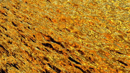 Golden texture with strong diagonal noise. Golden background. The rough surface is yellow on an...