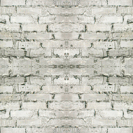 Seamless image of an old wall made of grey, worn brick. Light seamless background. Brick texture with symmetrical patterns.の写真素材
